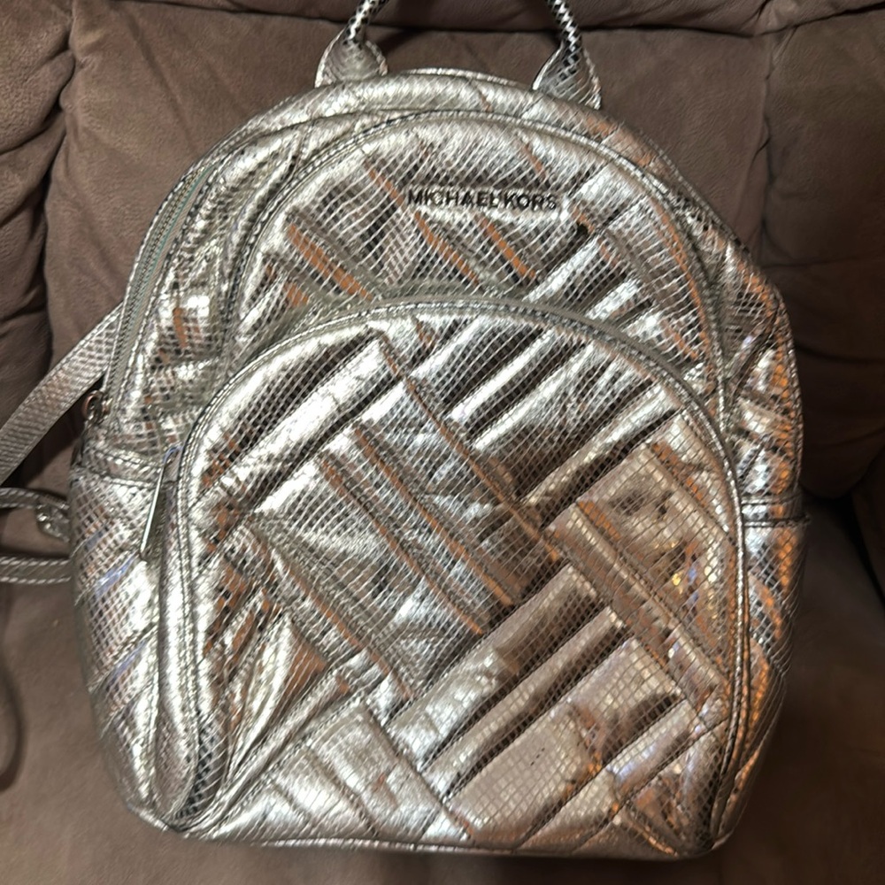 Silver Michael Kors leather backpack